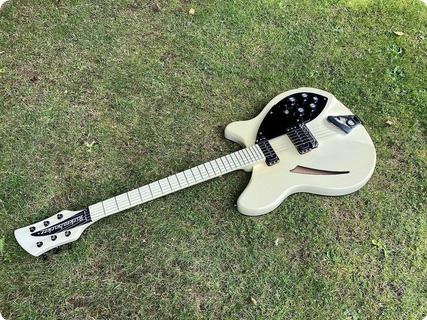 white rickenbacker guitar